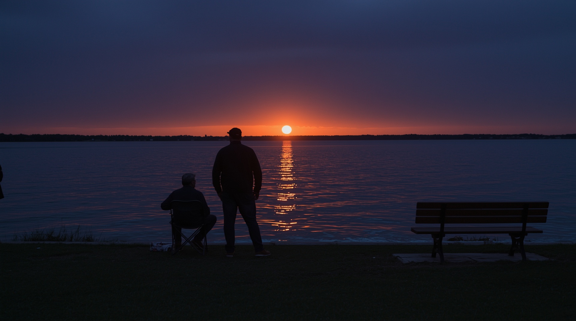 Residents watching rocket launch glow across Indian River Lagoon at dusk in Titusville Florida